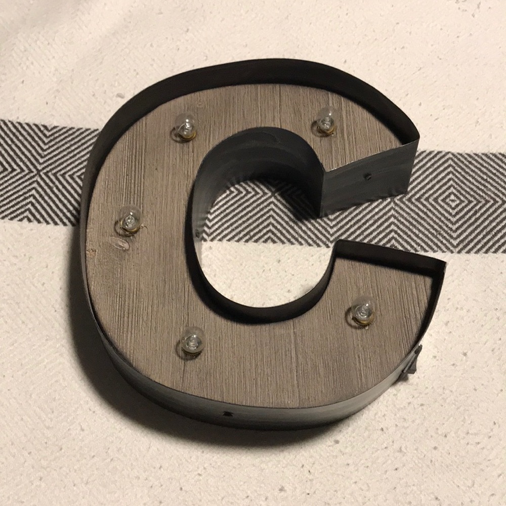 Marquee letter “c”